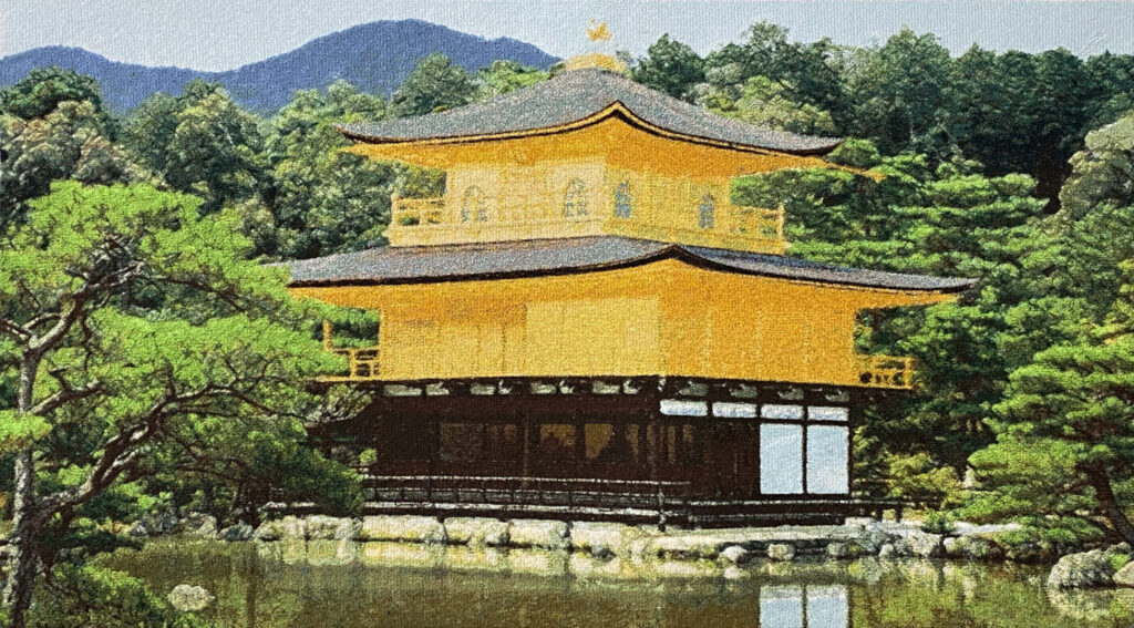 Photo embroidery of Kinkaku-ji using gold and silver thread, showing reflective textures and fine detail.